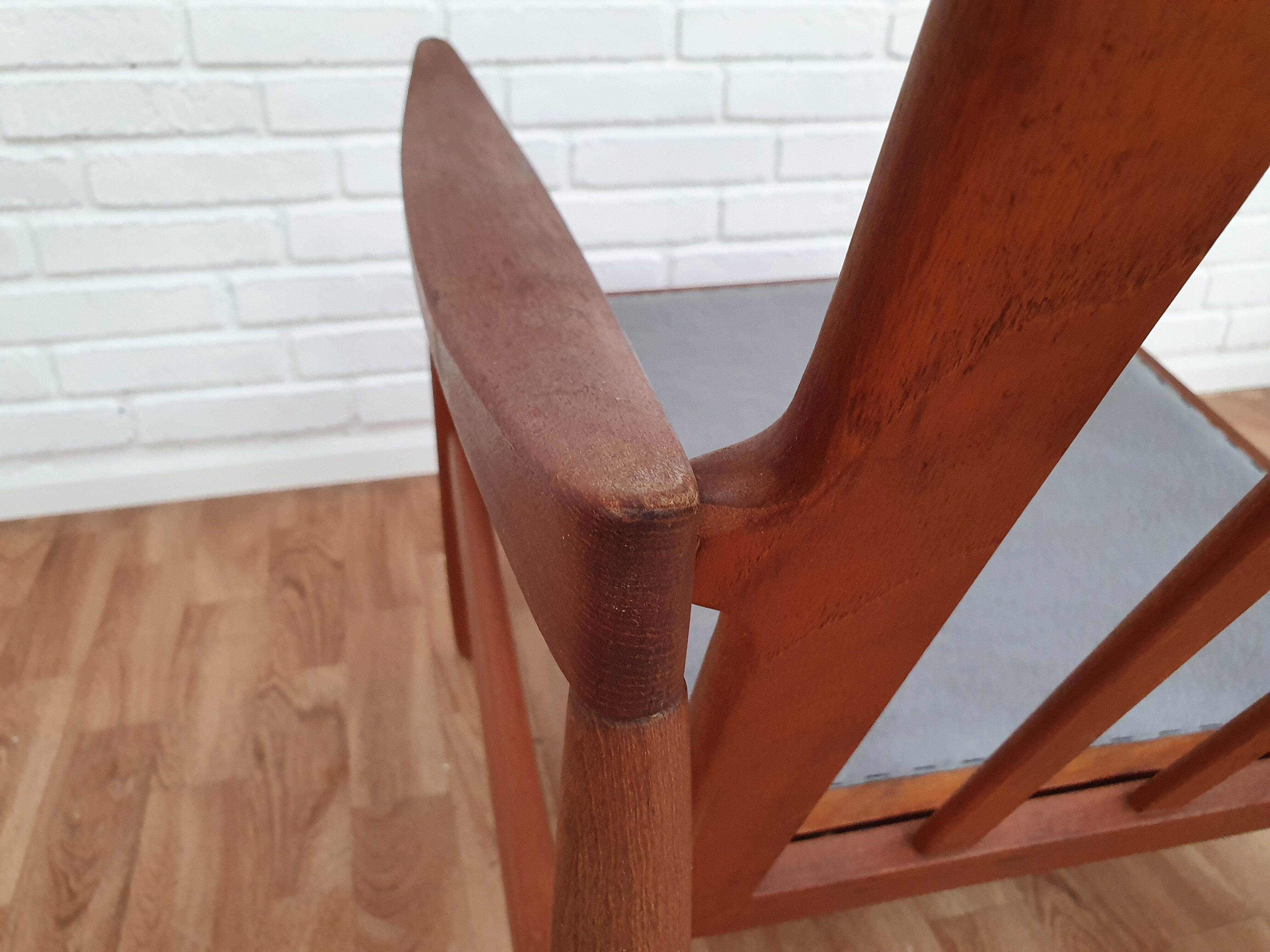 A pair of Danish armchairs, teak, wool, leather