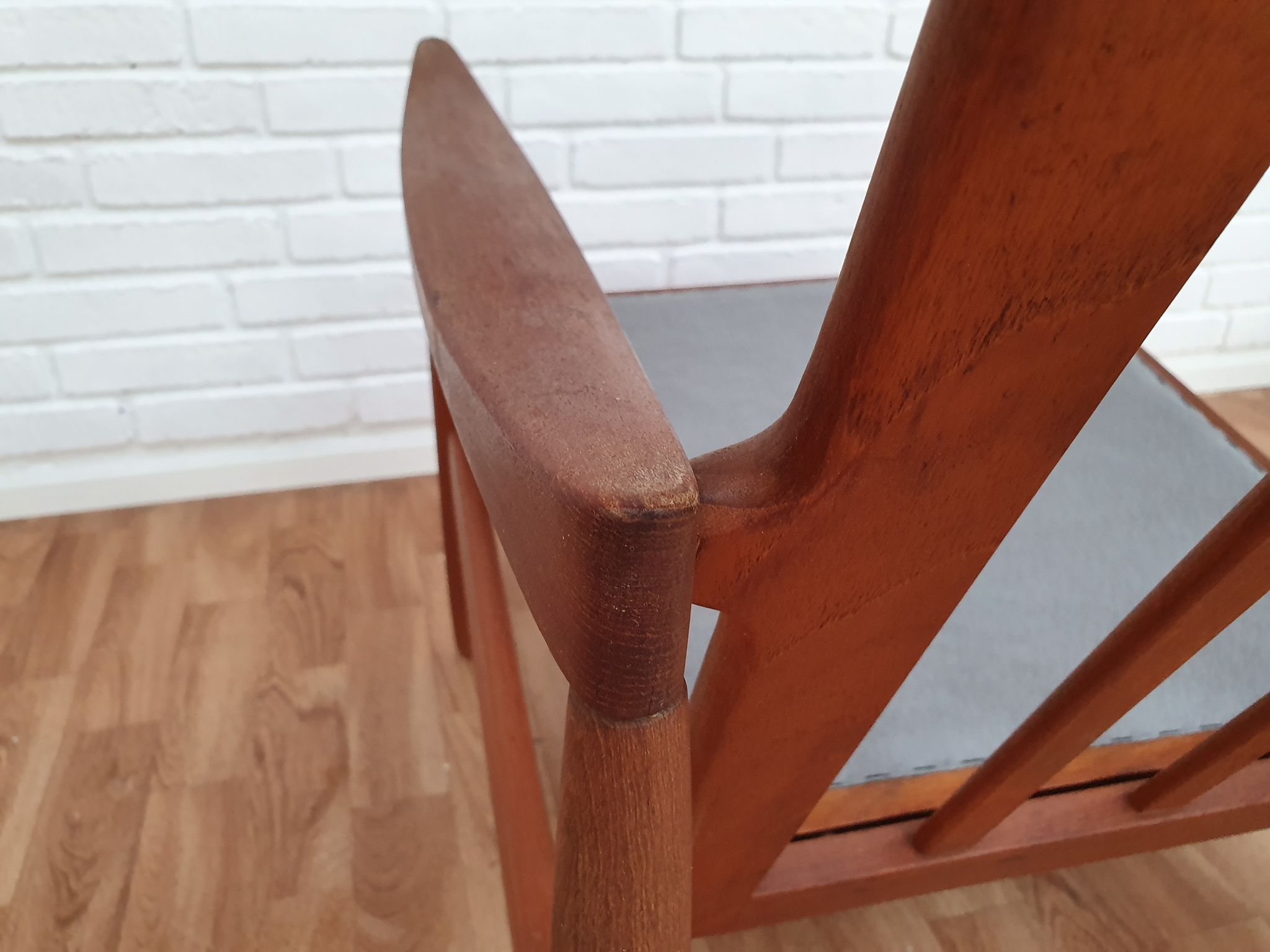 A pair of Danish armchairs, teak, wool, leather