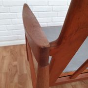 A pair of Danish armchairs, teak, wool, leather