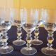 Six engraved crystal wine glasses. 1930
