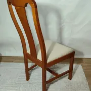 Set of 4 vintage chairs in stained wood and cream fabric.