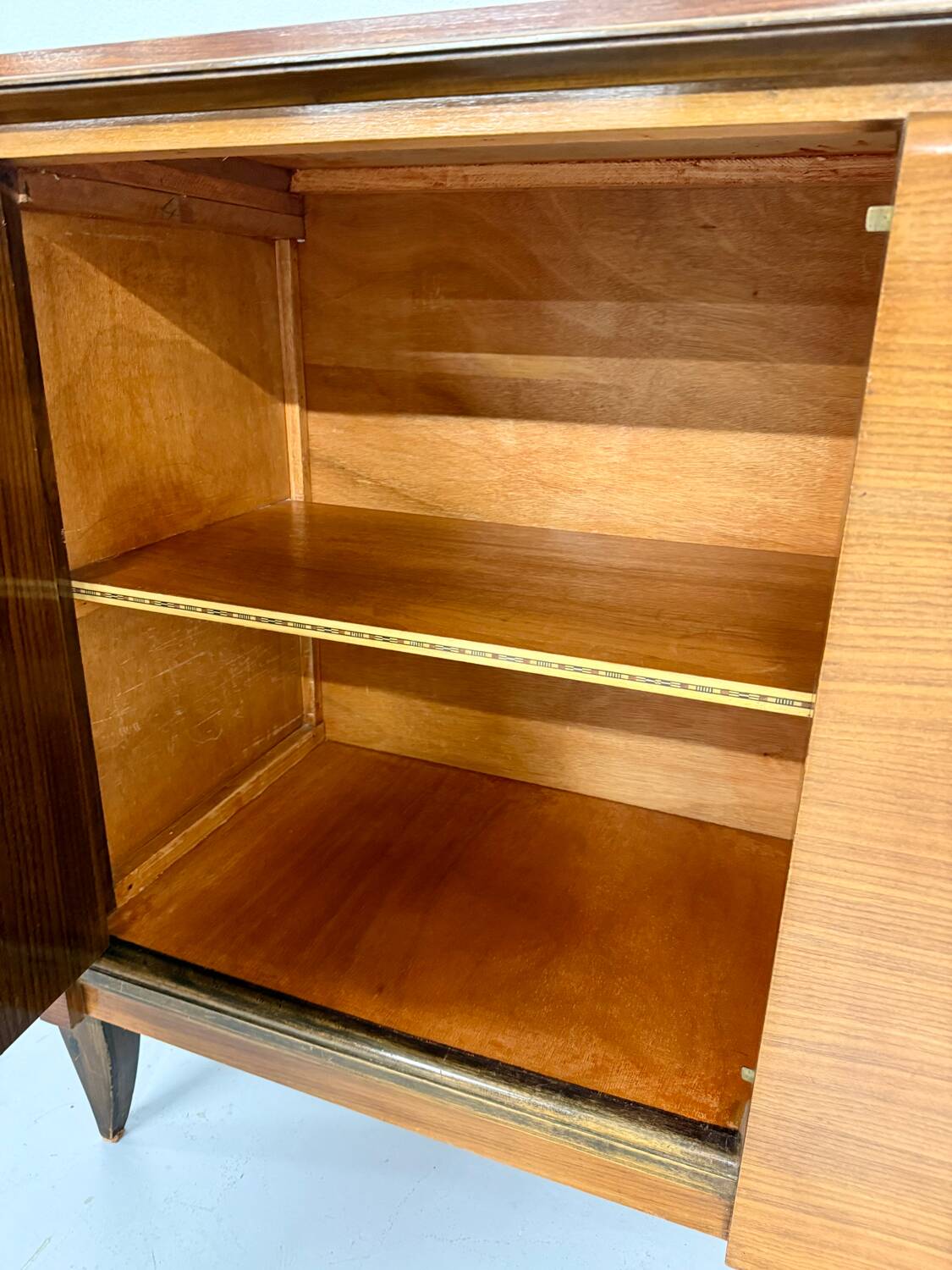 Antique art deco sideboard from the 1930s with veneered wood and bronze insert