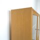 Tall LP display cabinet with glass doors and magazine shelf from Sweden