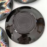 5 plates with stylized star pattern