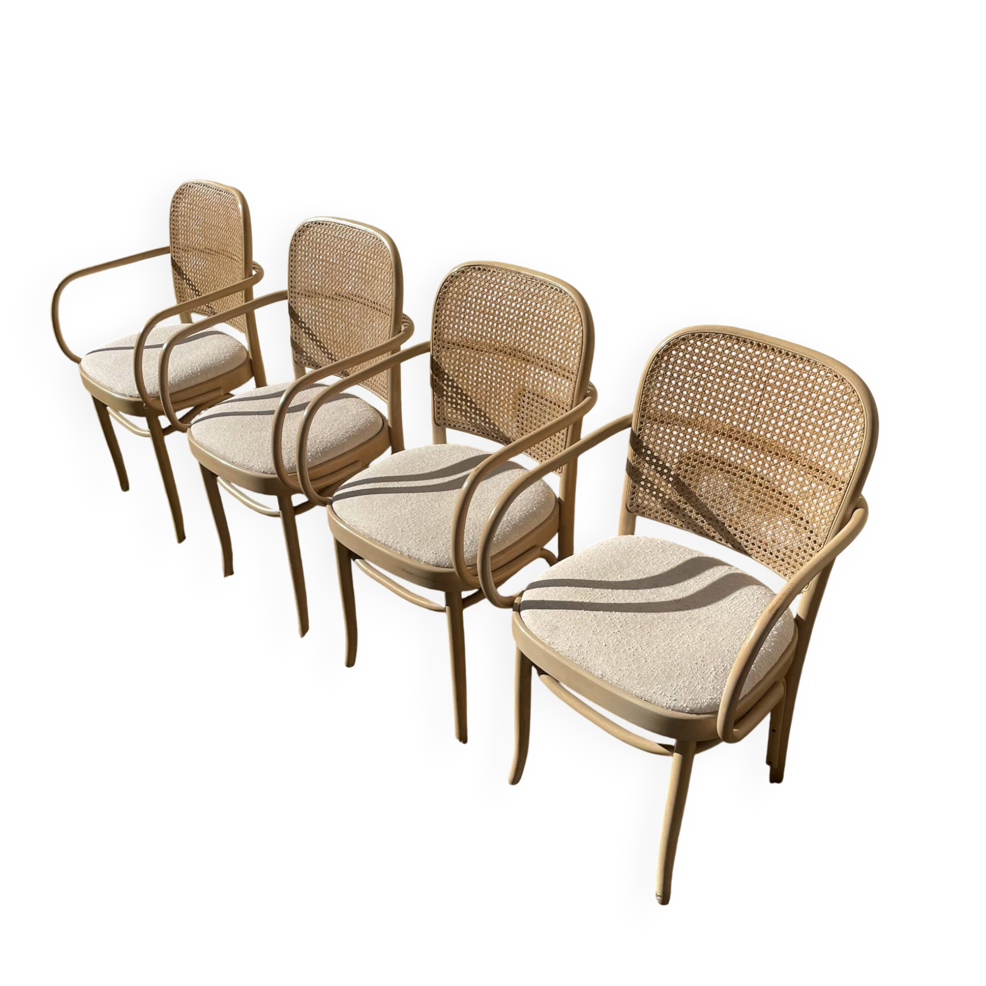 4 curved wooden dining chairs