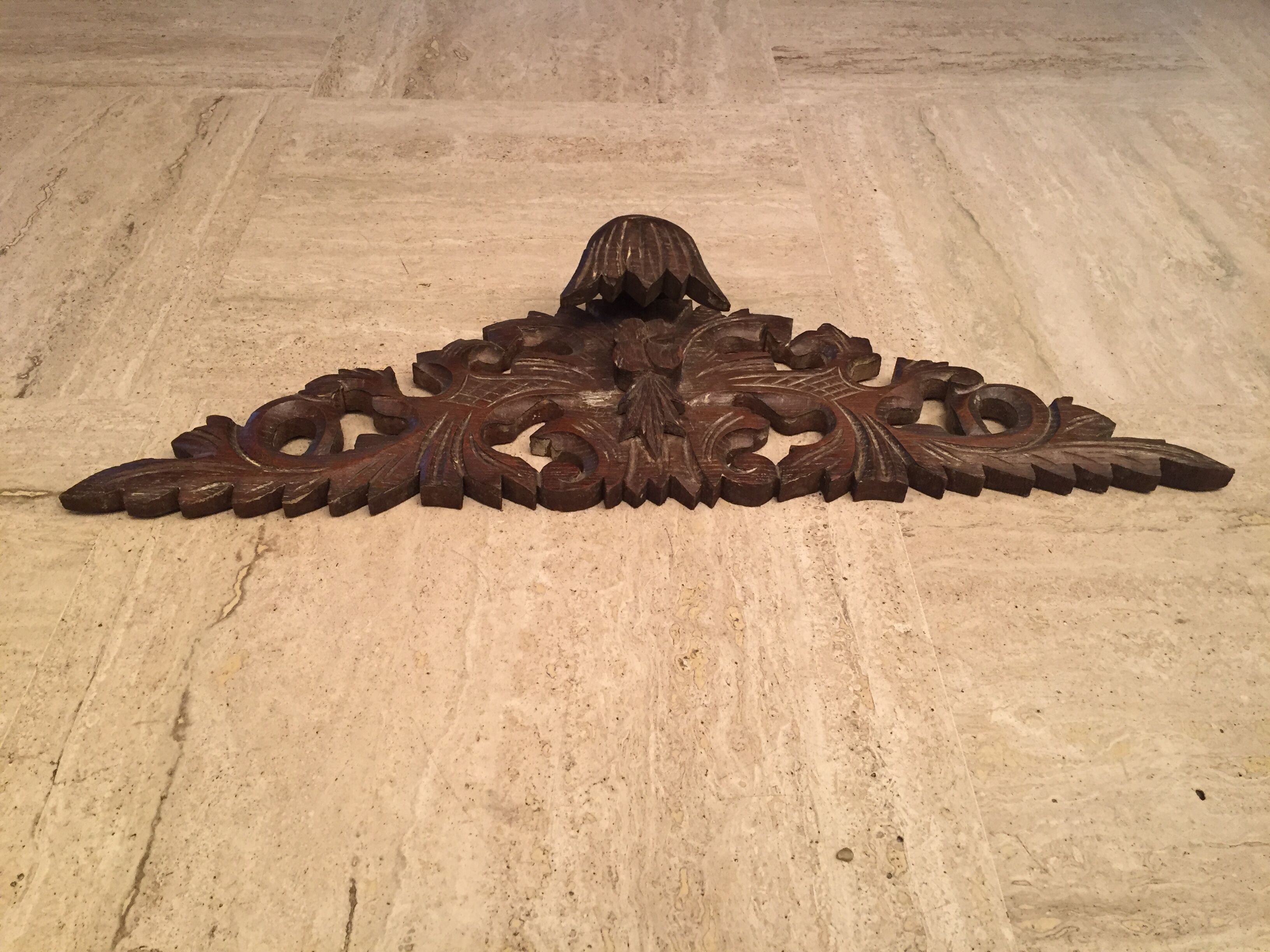 Former finely carved wooden pediment