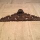 Former finely carved wooden pediment