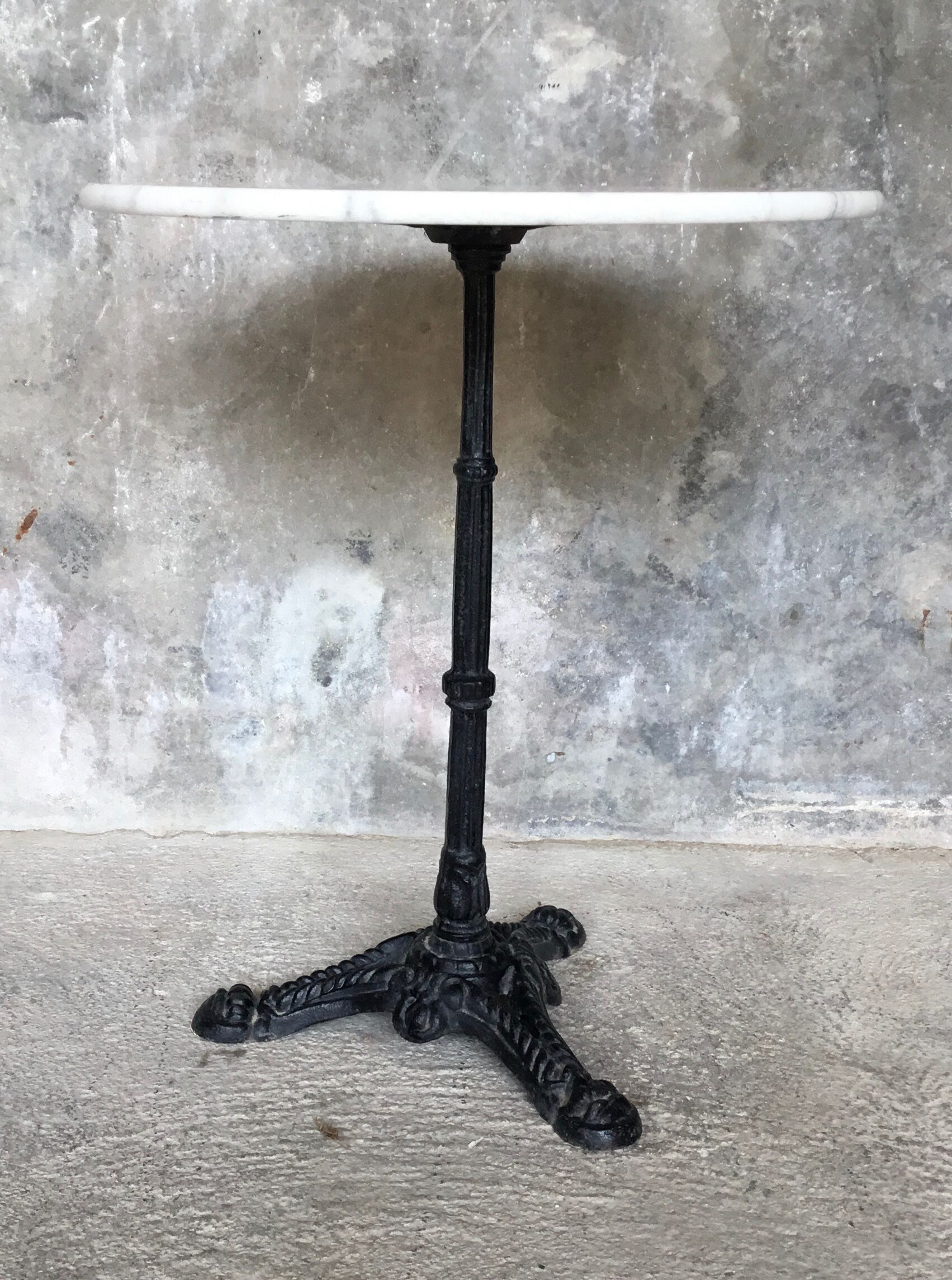 Round marble bistro table and cast iron base