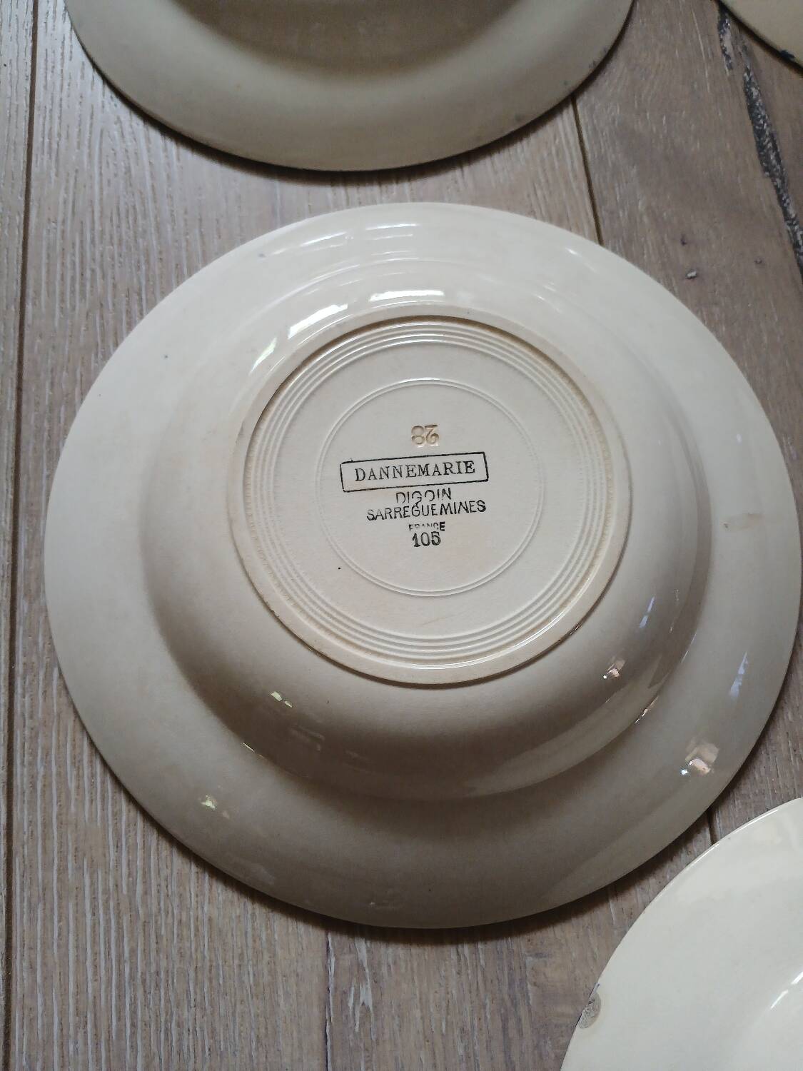 7 Digoin and Sarreguemines soup plates