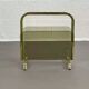 Vintage magazine rack in smoked glass and brass.