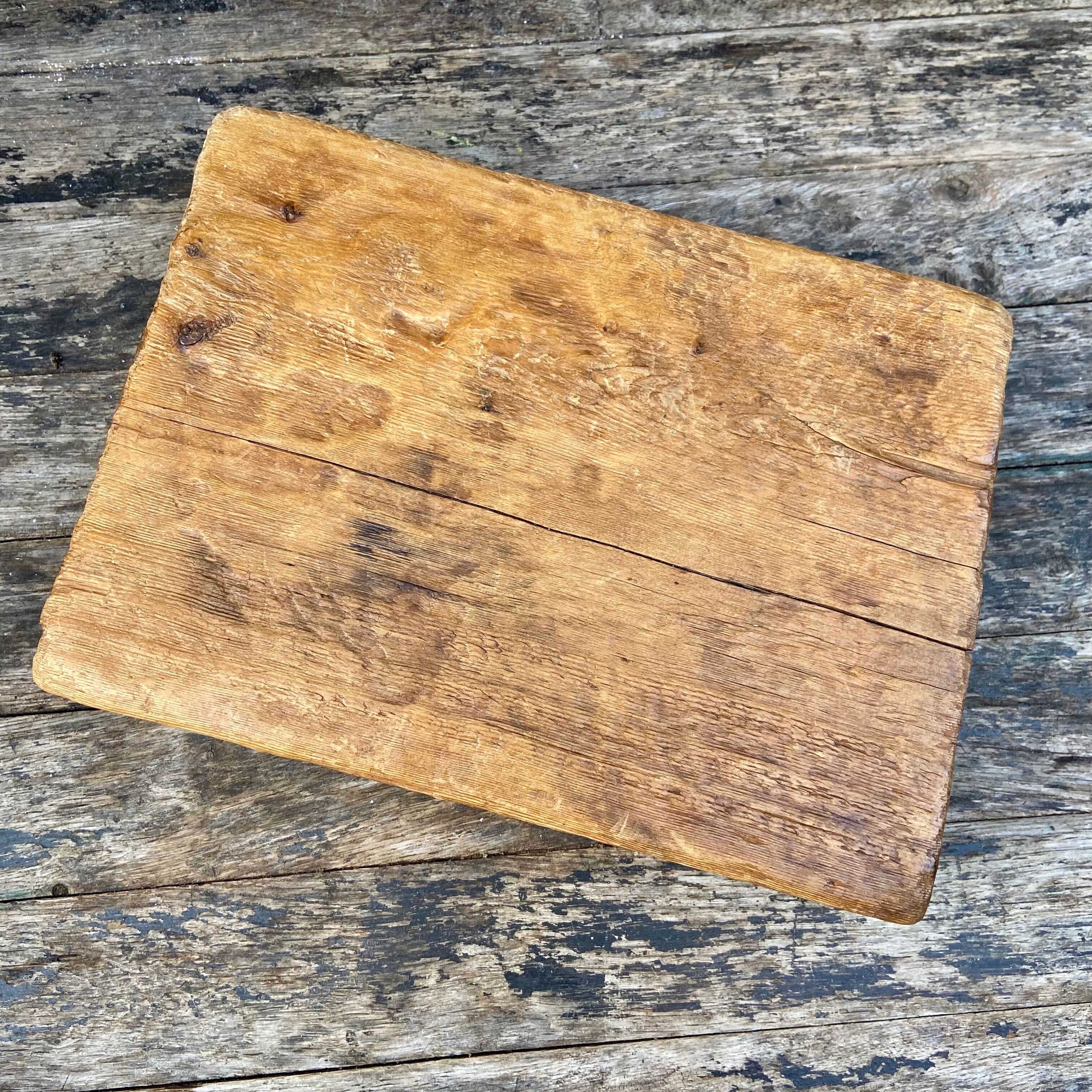 Old solid wood log cutting board