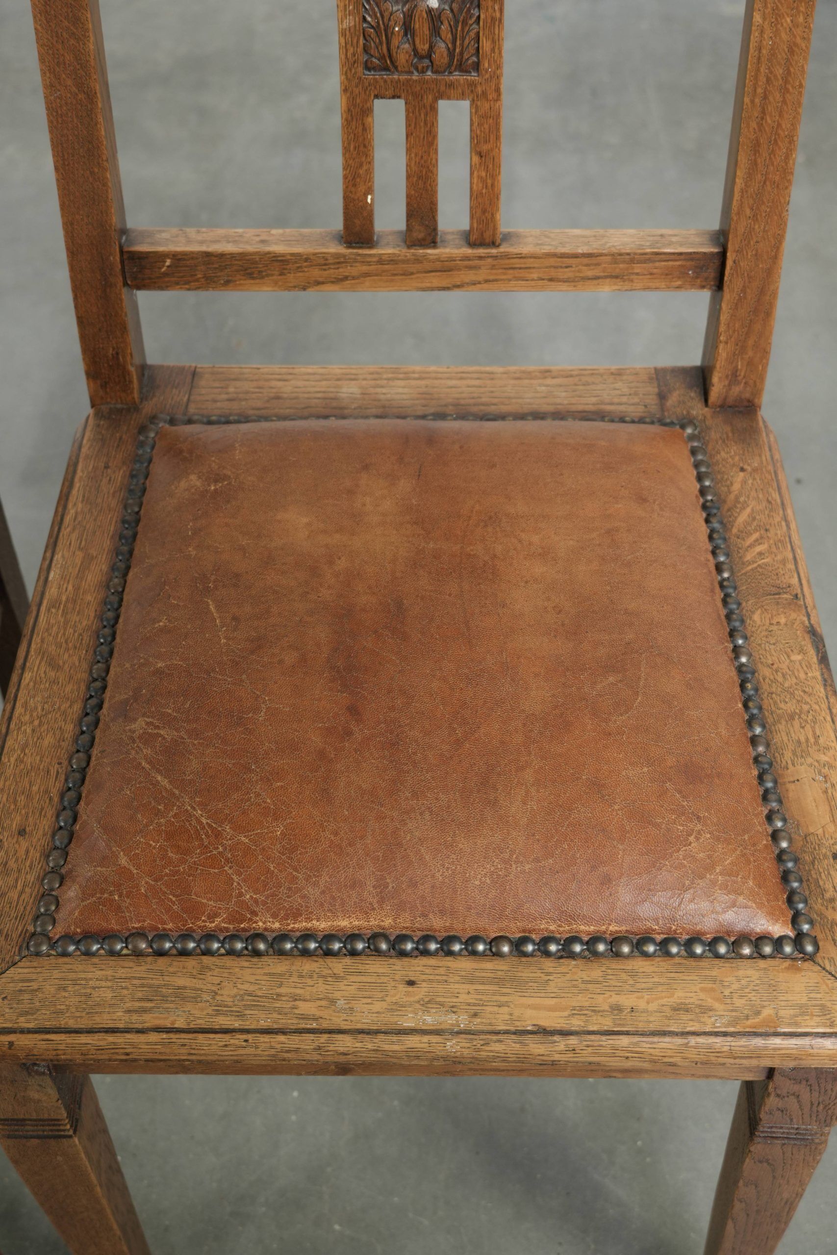 Set of 4 antique oak dining chairs in Art Nouveau style with sheepskin