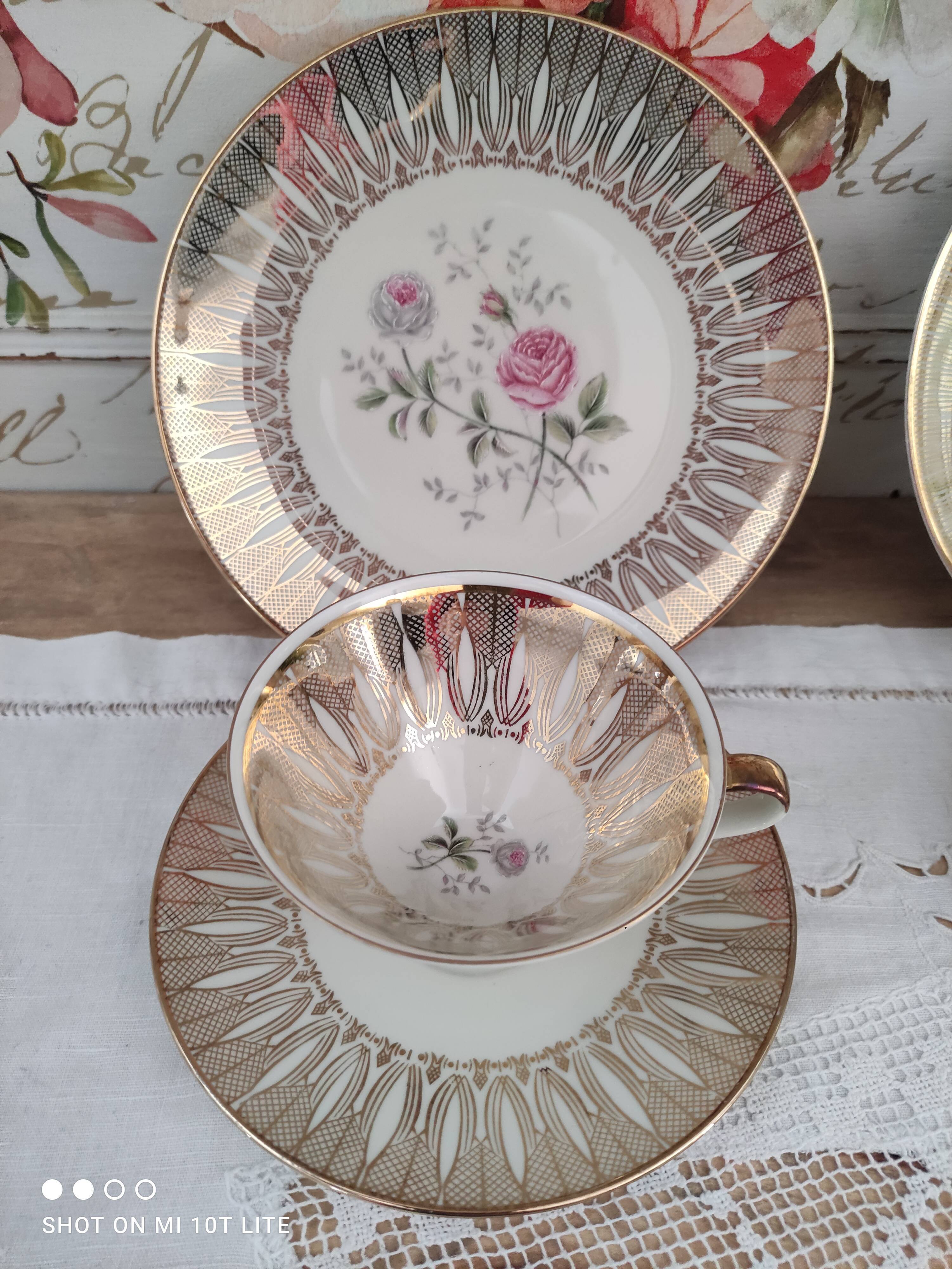 Head to head in porcelain Bavaria 6 pieces floral decoration and gilding