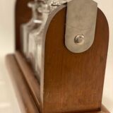 Portable Art Deco liquor cabinet in mahogany & metal with 3 Baccarat crystal bottles.