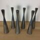 6 aluminium cast iron diabolo candlesticks