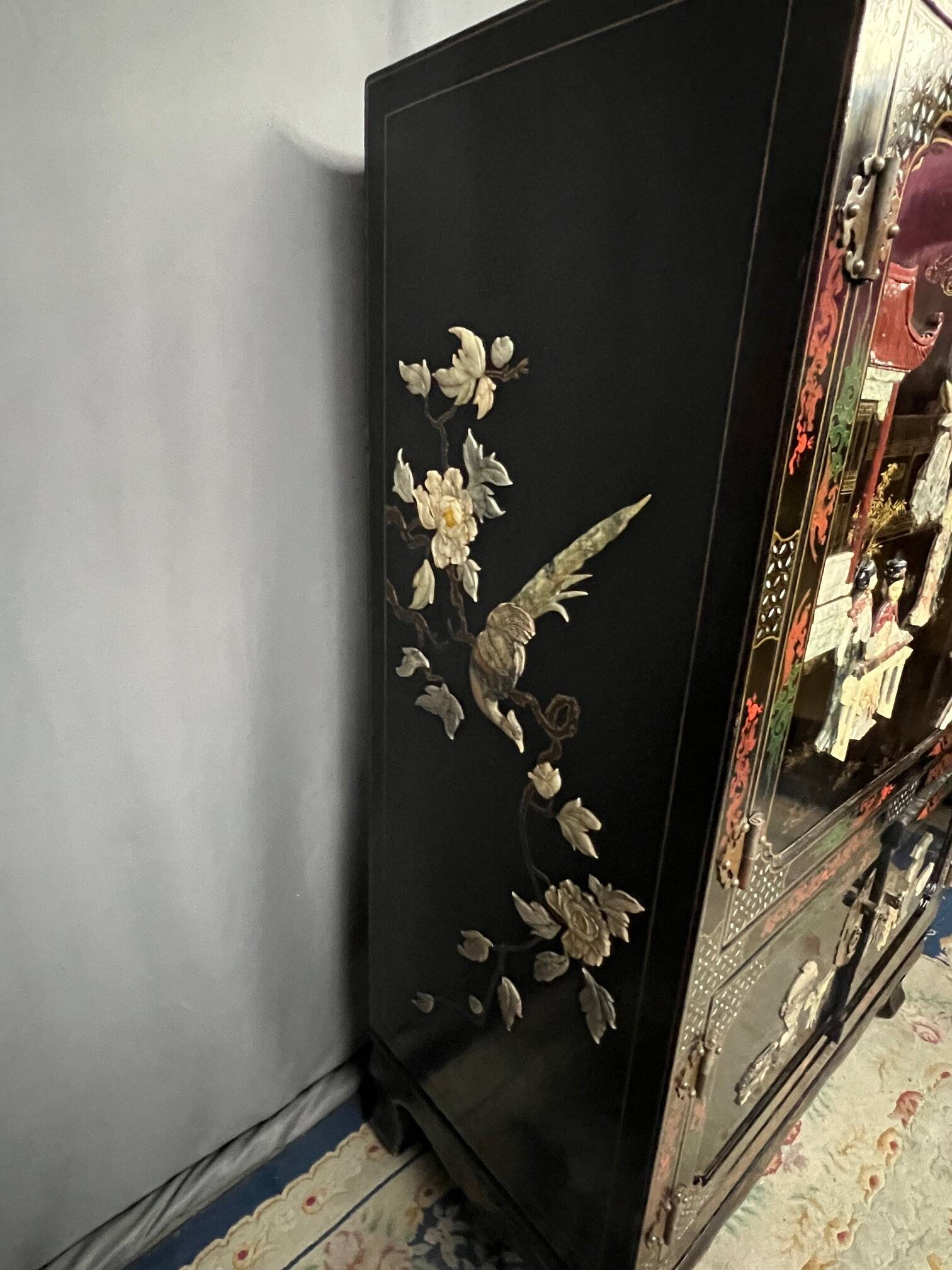 Chinoiserie-style cabinet. Inlaid with steatite, jade, marble, and ivory.