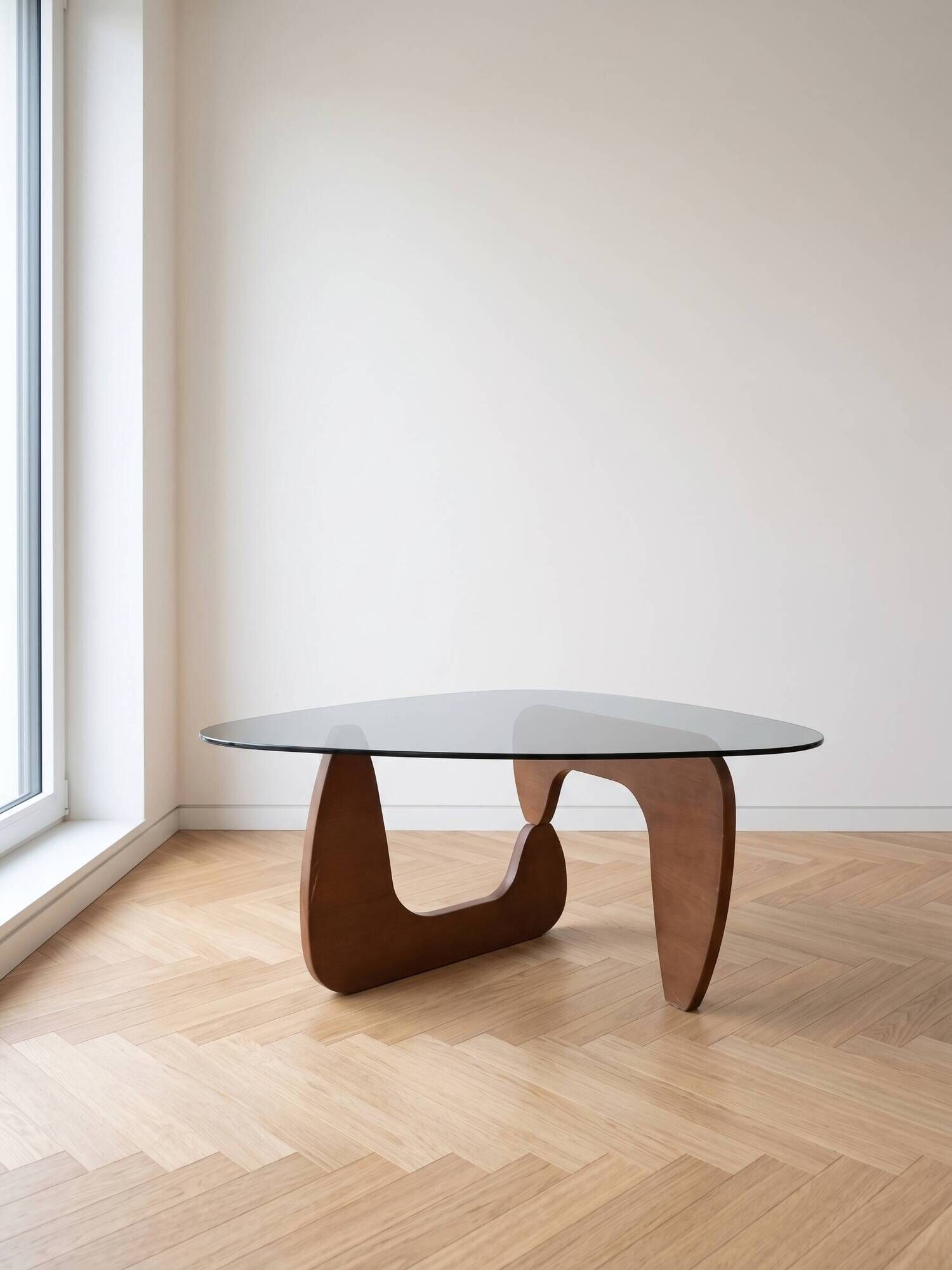Vintage organic coffee table in smoked glass and walnut.