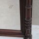 Imposing beveled mirror with wooden frame