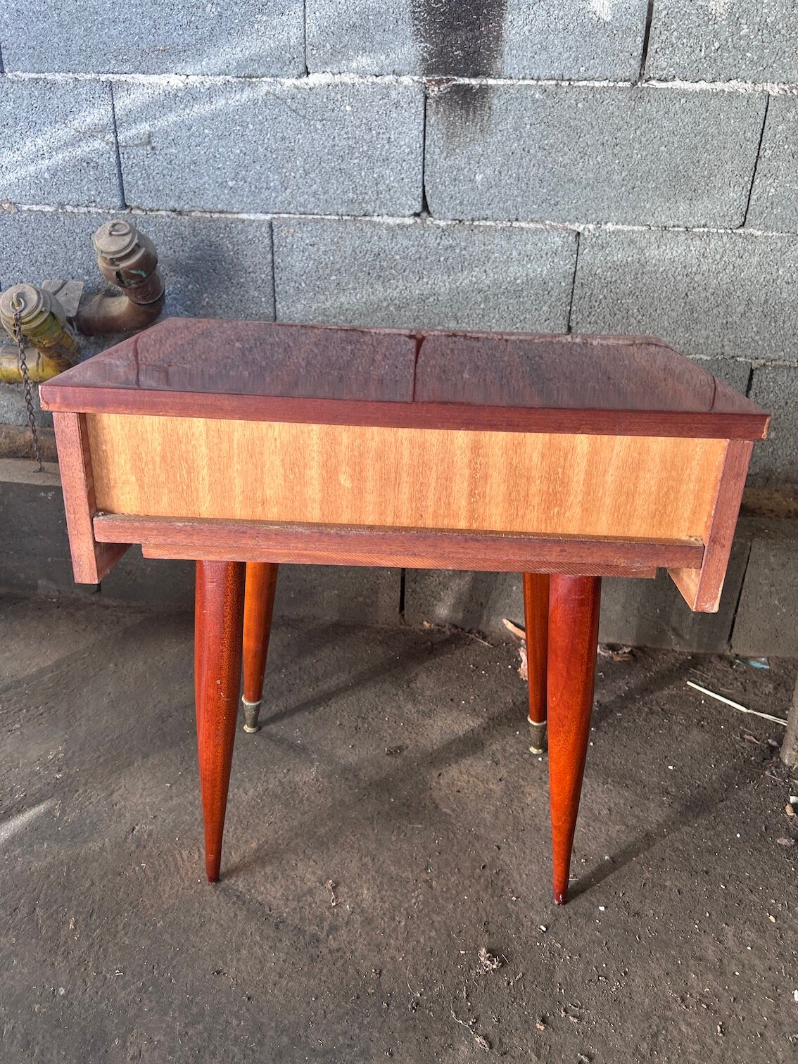 Pair of bedside or night tables in lacquered mahogany with compass feet