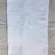 Fine linen sheet with ribbon and florets, monogrammed mr
