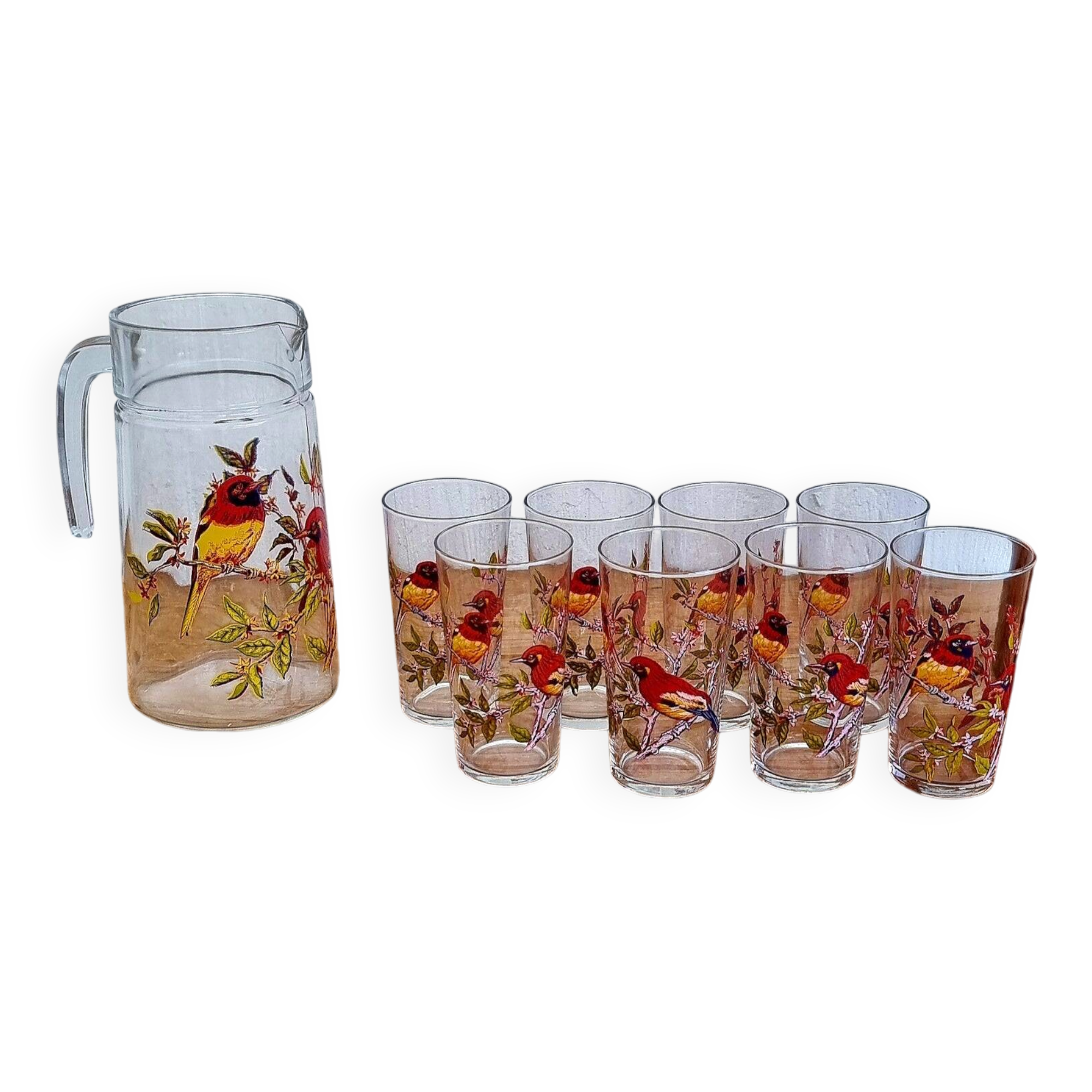 Vintage 1970s orangeade set with a jug and 8 glasses decorated with birds.