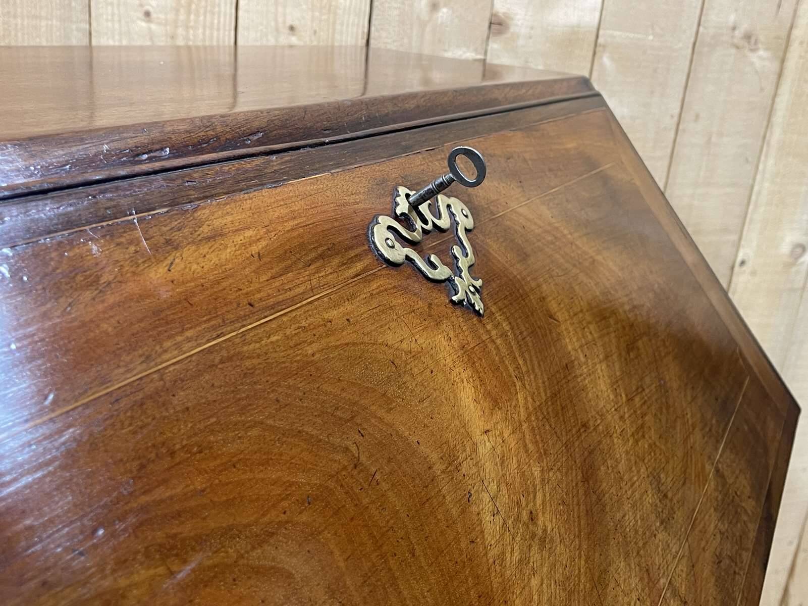 English donkey desk in Georgian style dating from the 19th century in mahogany and oak