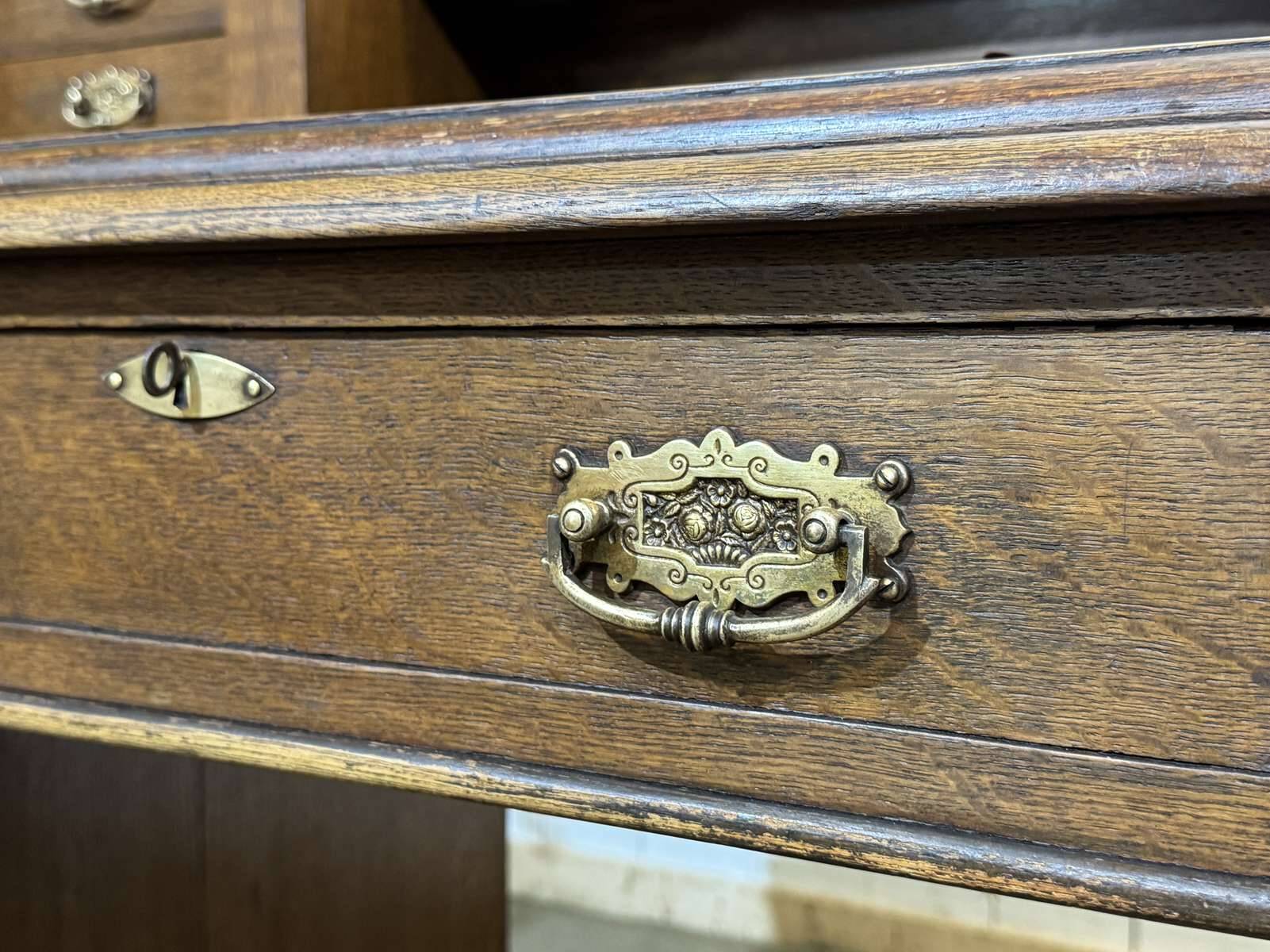 English oak graduated desk from the late 19th century.
