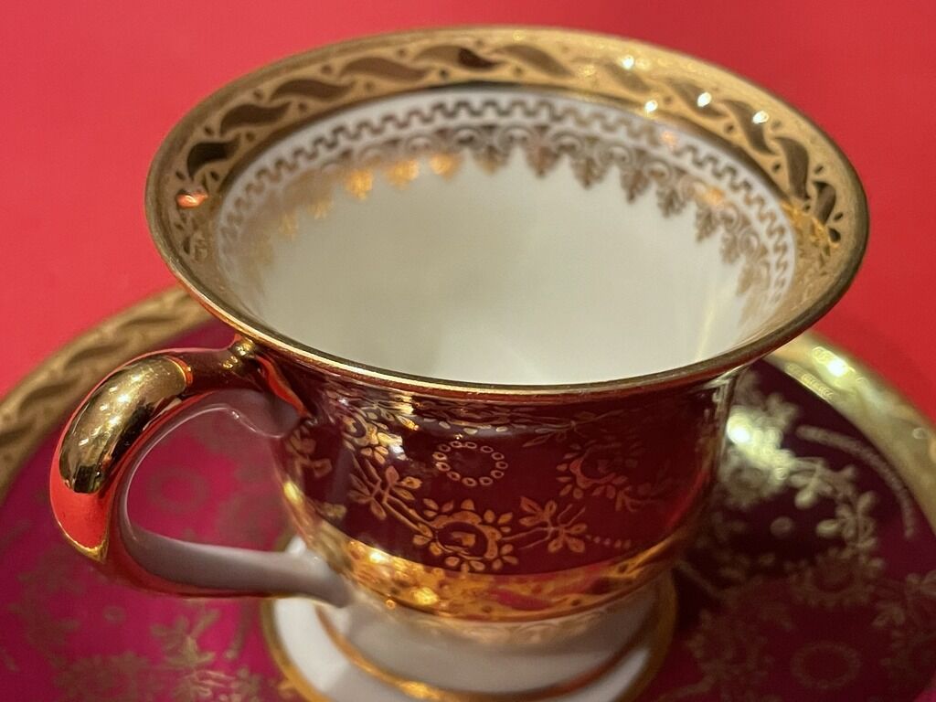 Cup and under cup with floral interior