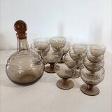 Smoked glass glasses and carafe from the 60s and 70s