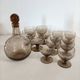 Smoked glass glasses and carafe from the 60s and 70s