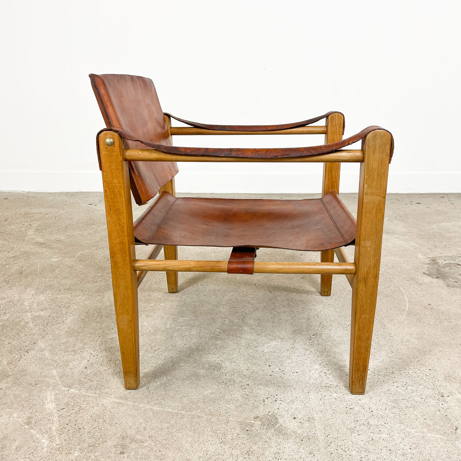 Vintage danish design cognac leather safari chair