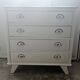 Vintage commode in solid pear wood, revamped in glossy white – tapered legs.