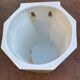 Wall-mounted cache-pot in white porcelain
