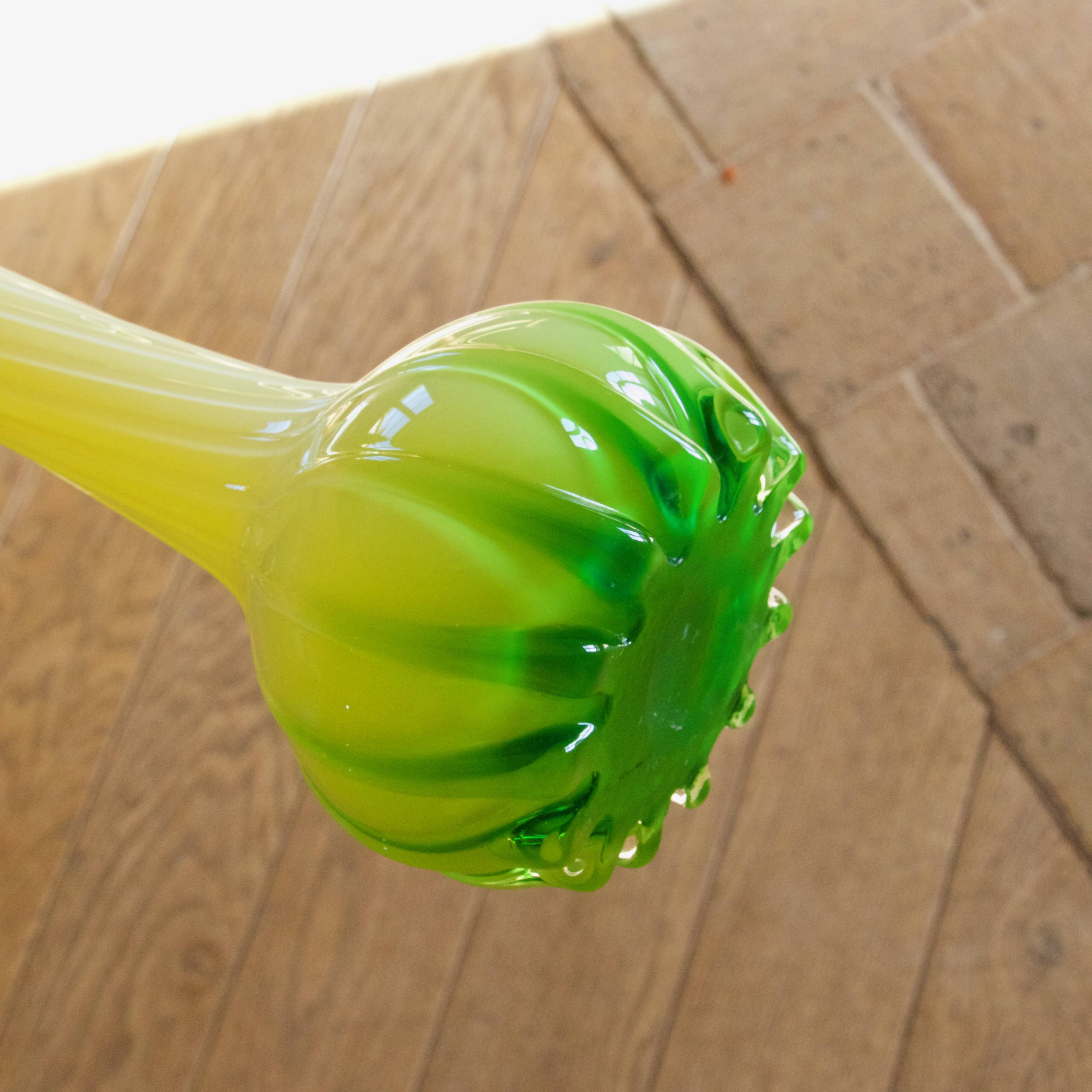 Blown glass vase from Murano in the shape of a yellow flower.