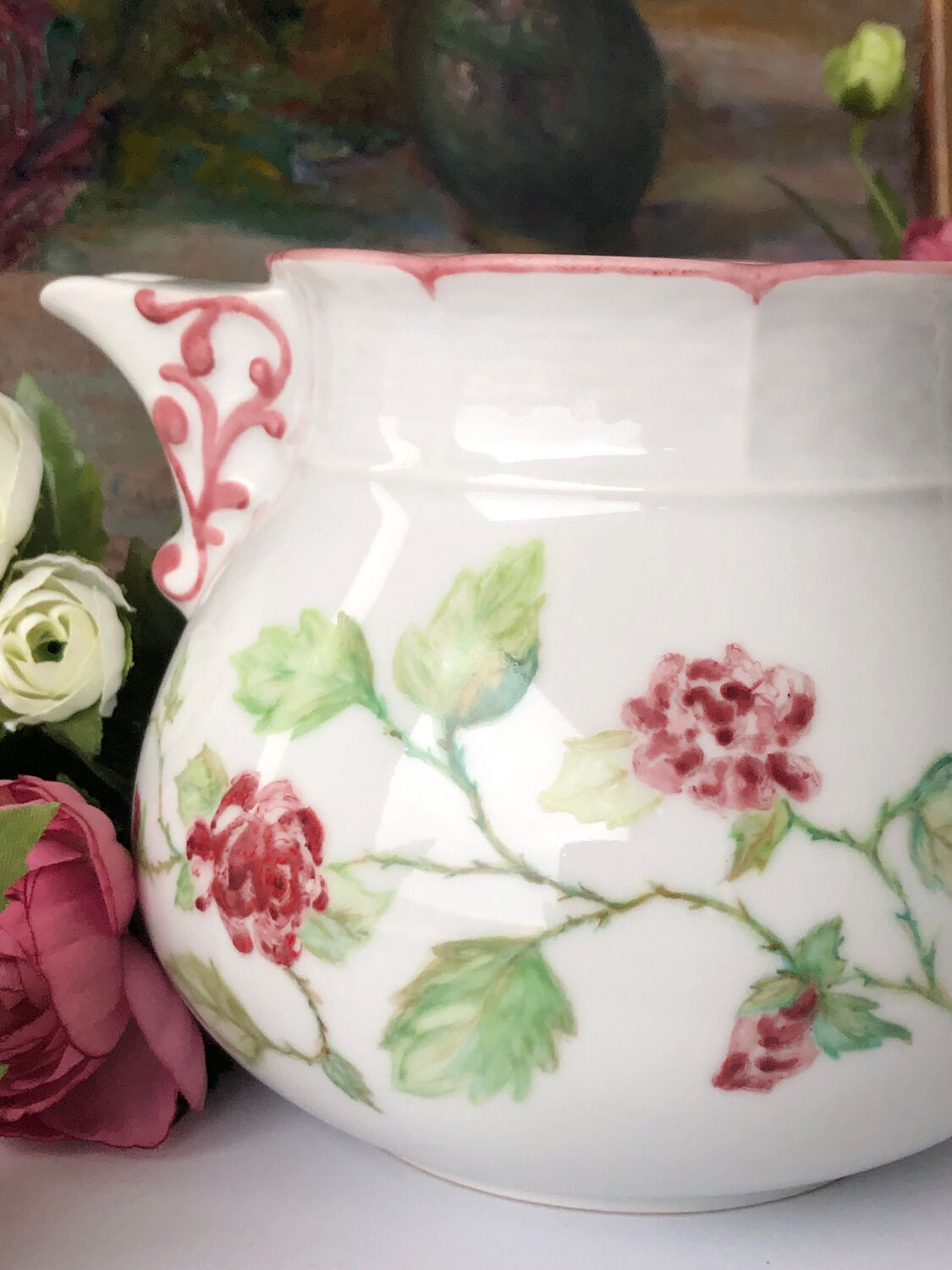 Old white and pink teapot