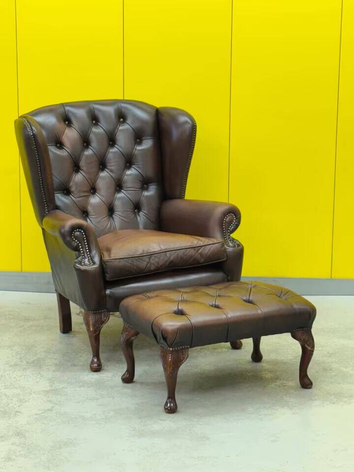 Dark Brown leather chesterfield wing chair with Ottoman