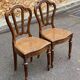 2 Louis Philippe chairs in solid carved wood and caning from the 19th century