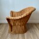 Braided wicker armchair