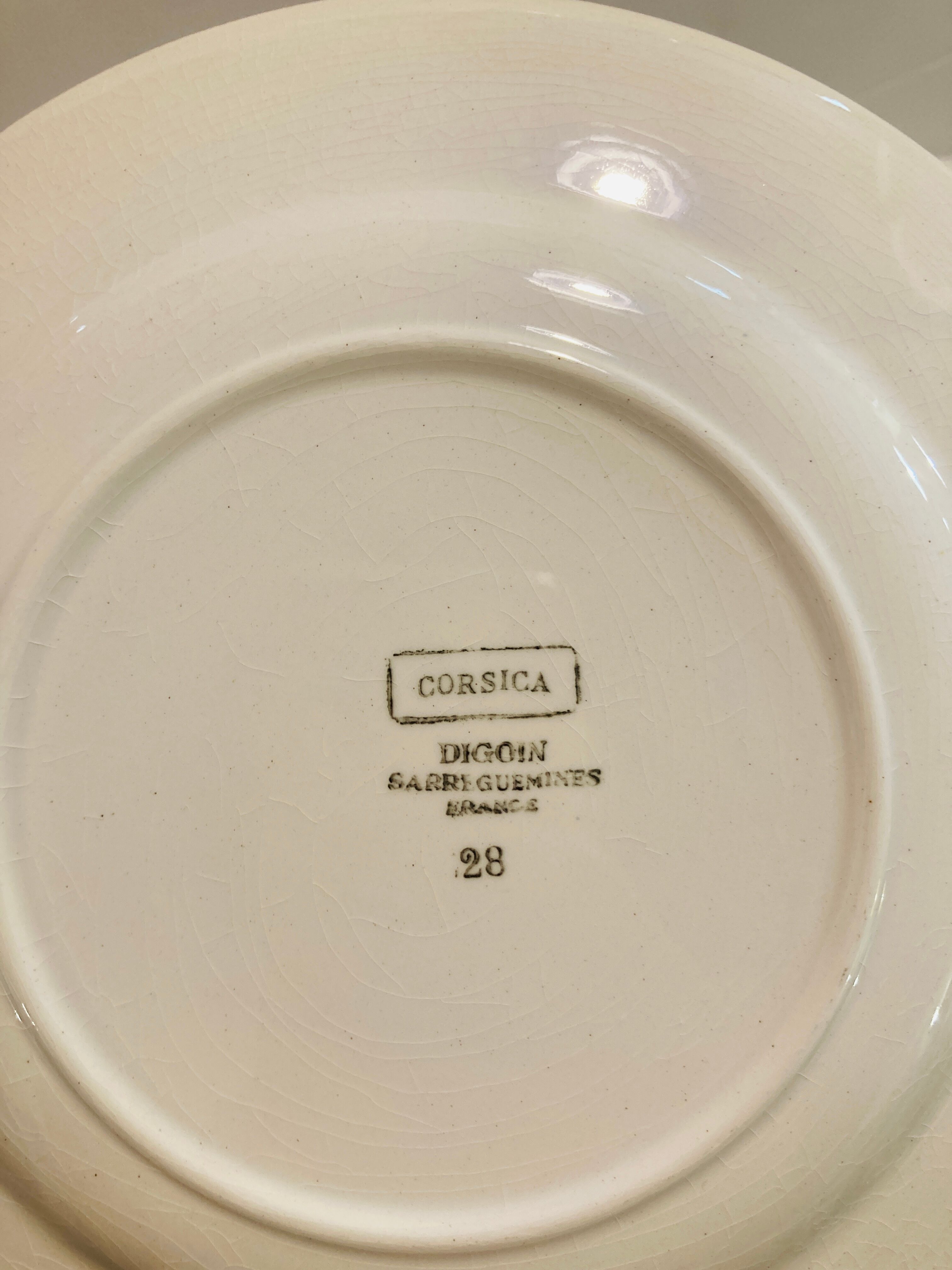 4 white porcelain plates with blue flowers