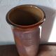 Purple enamelled sandstone vase