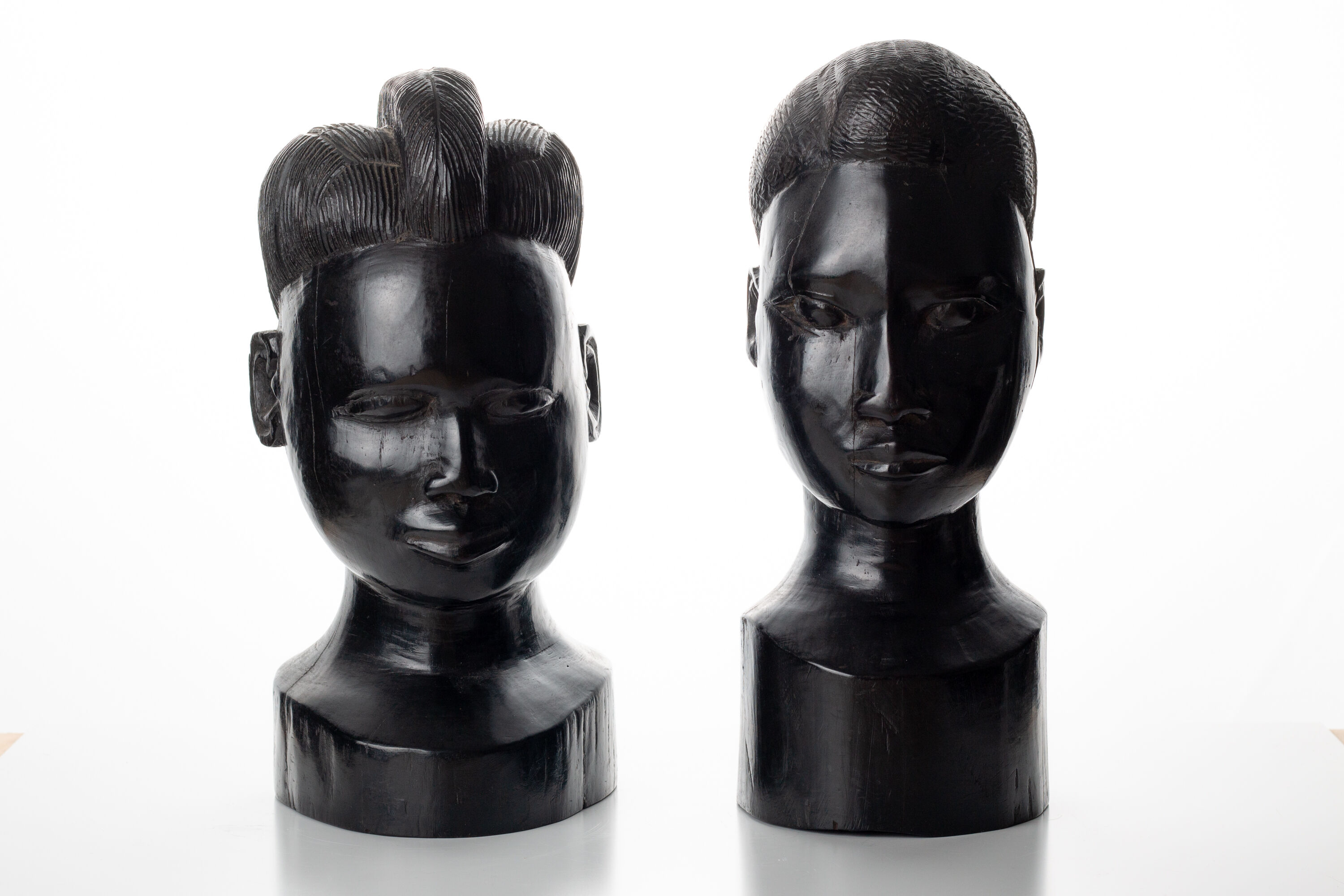 Pair of African busts carved in ironwood / ebony / vintage / book clamps