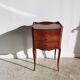 Three-drawer cherry bedside table