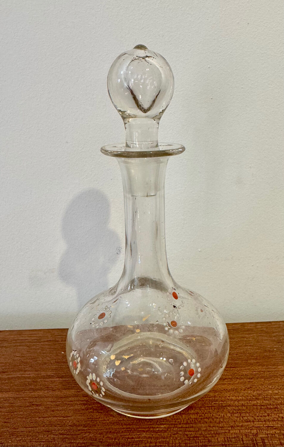 Antique blown glass carafe, enamelled with floral decoration, in the style of Legras.