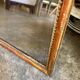 Wooden mirror with gilded stucco and beaded frieze, 45 x 37 cm