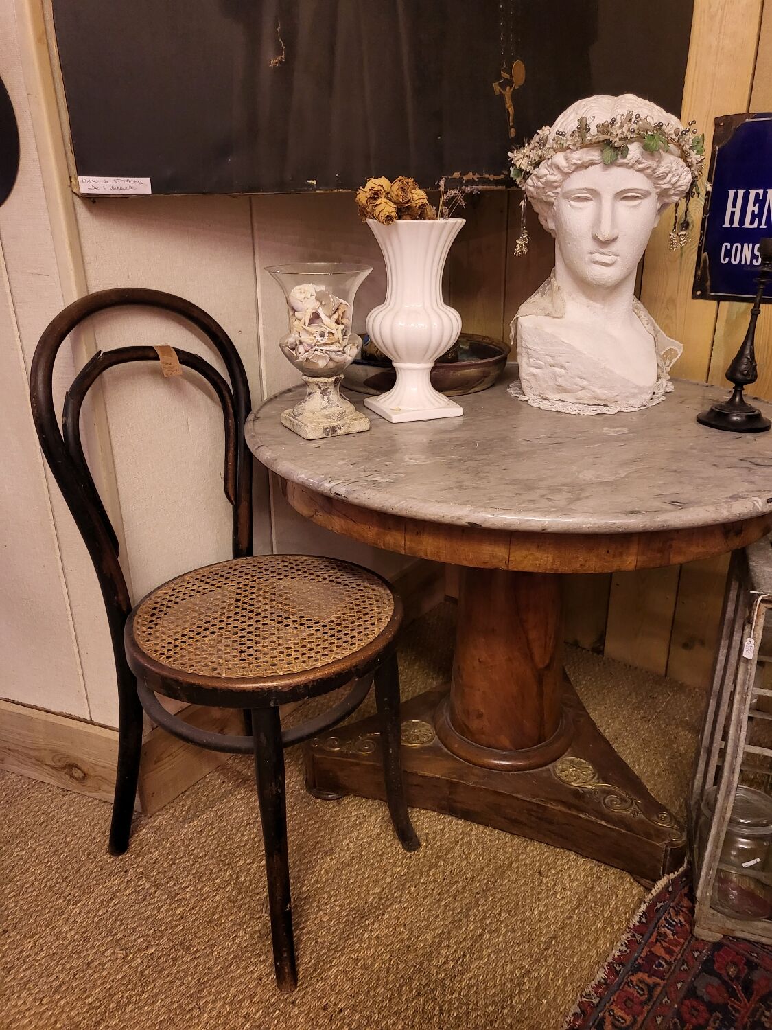 Pedestal table above marble