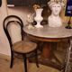 Pedestal table above marble