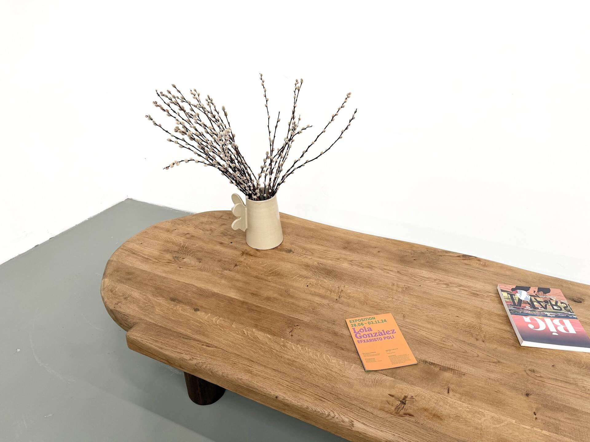 XXL oval coffee table in solid oak, cylindrical base, 1950s.