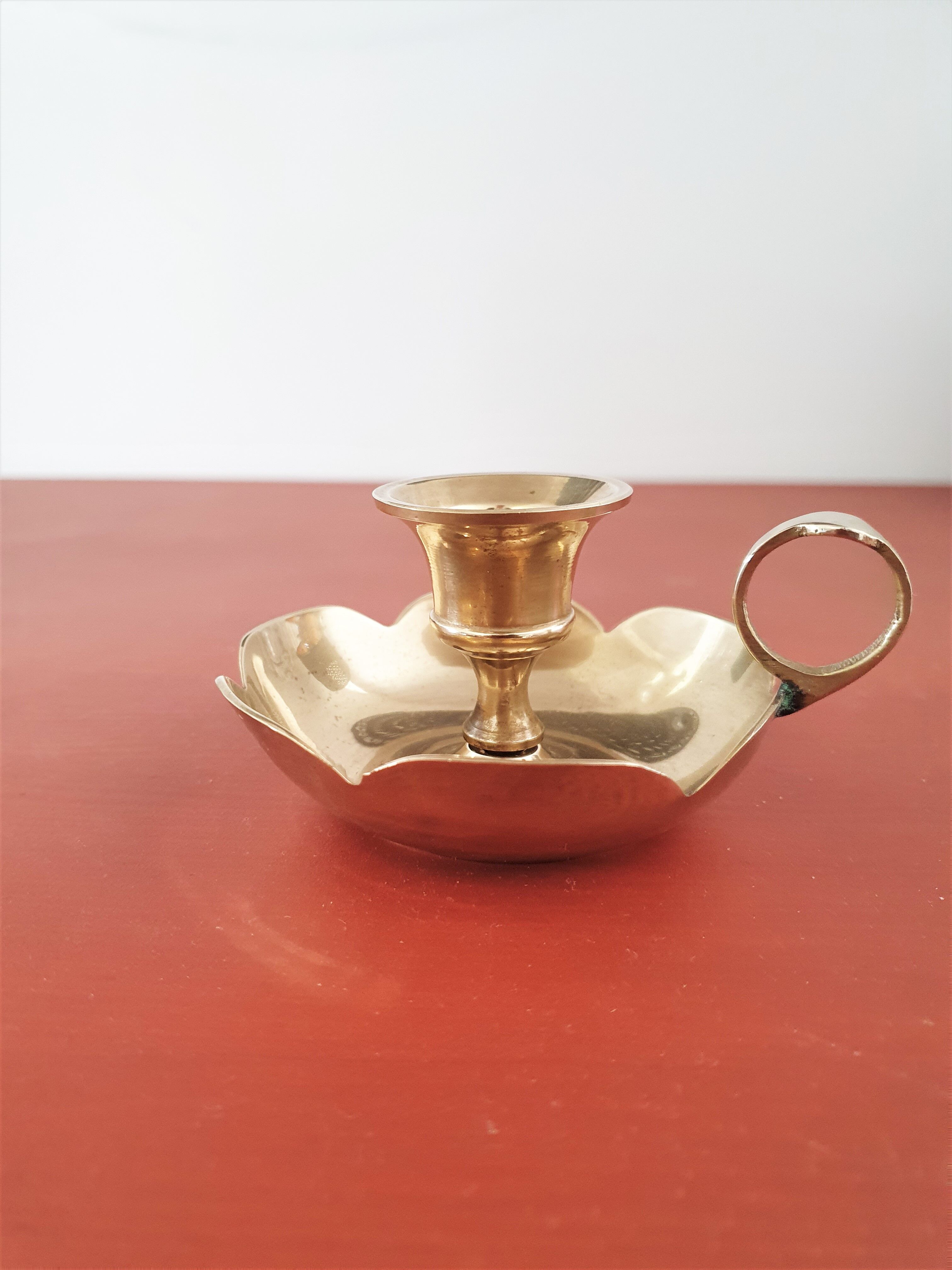 Golden brass candle holder