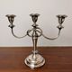 Vintage twisted chandelier with three lights in silver-plated metal.