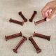 Set of 8 Bakelite knife rests with mahogany effect Art Deco